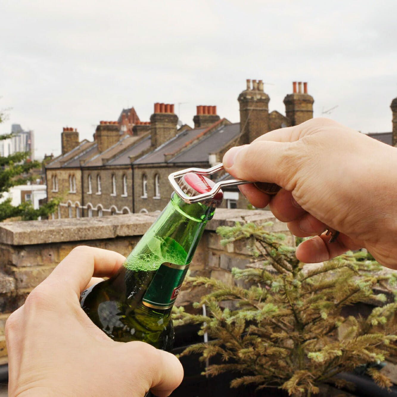 Sleutelhanger Flessenopener huismerk kopen in de aanbieding