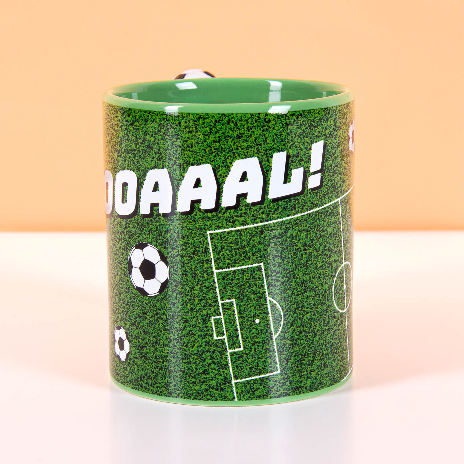 Voetbal mok met draaiende bal