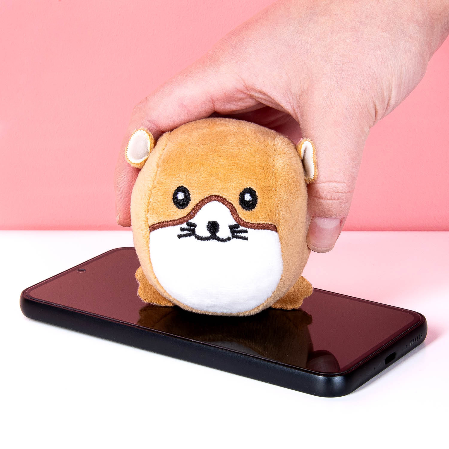 Hamster stressbal en schermreiniger